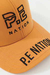 P.E. NATION | Courtside Cap - Golden Oak